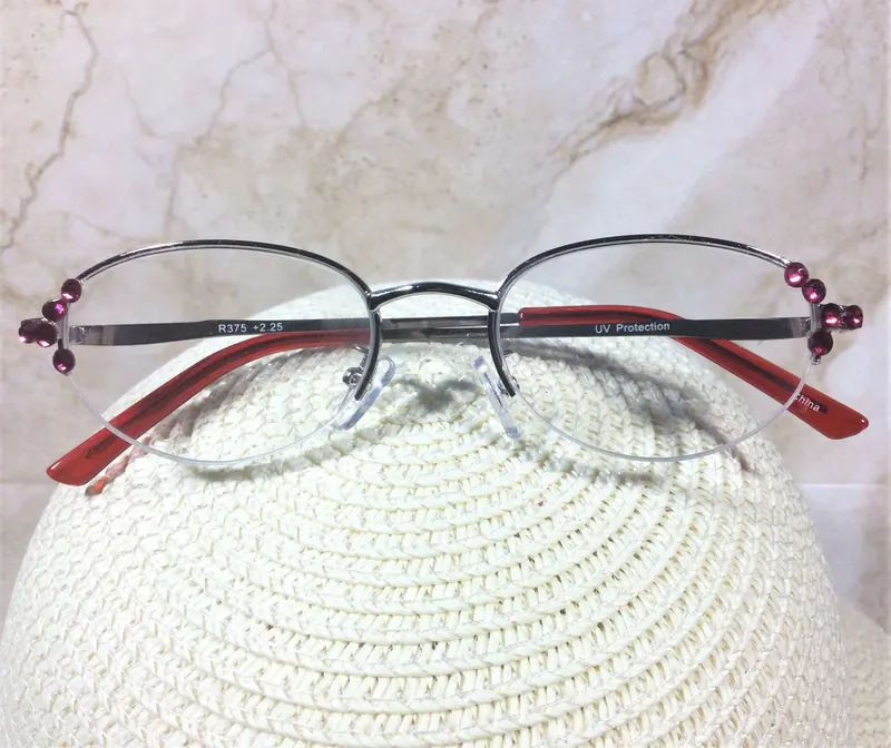 BRIGHT RED CRYSTALS Highlight this reader. Glasses are designed to flatter your face. Free Faux Leather Case with your N
