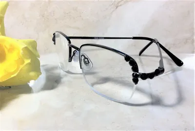 CLASSIC READERS with Spring Hinges. BLACK Genuine Crystals enhance the look of the frame. Free Faux Leather Case w/your 