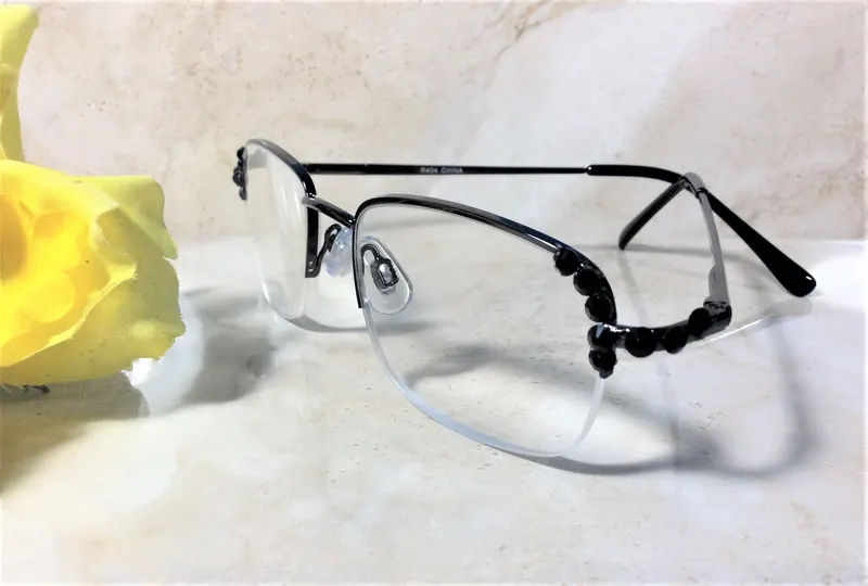 CLASSIC READERS with Spring Hinges. BLACK Genuine Crystals enhance the look of the frame. Free Faux Leather Case w/your 