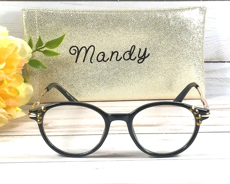 Simple Sophistication. Genuine Gold Swarovski Crystals accentuate the frame. Faux Leather Glitter Case. +1.50 strength