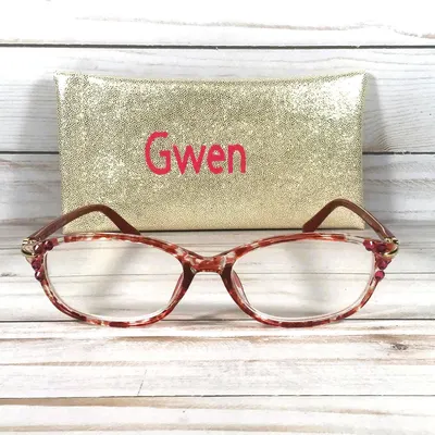 Red Swarovski Crystals highlight the frame of this reader. Faux Glitter Case with a Name. +1.25