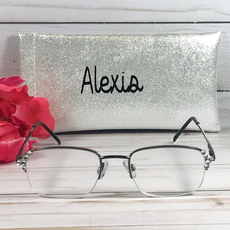 Clear Crystals sparkle and shine on this reader. +1.25 Personalized case.